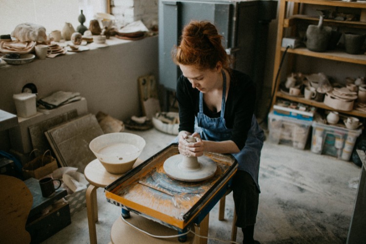 artisan making pots