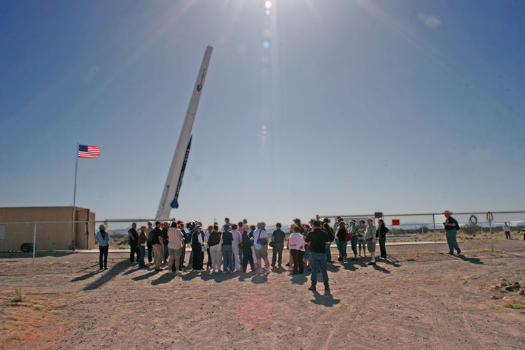 Memorial spaceflight attendees witnessing the launch pad setup